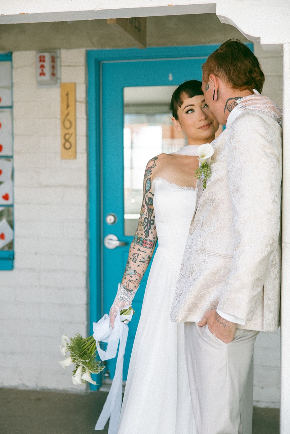 A quiet portrait in the turquoise doorway — Las Vegas