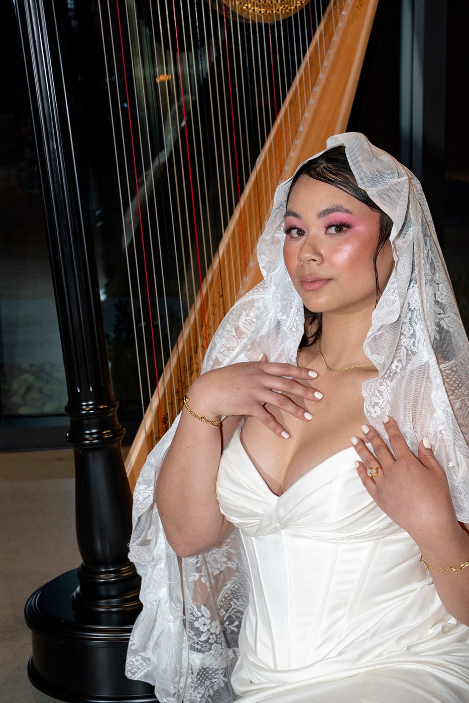 Bridal portrait beside the harp — The Sky Room
